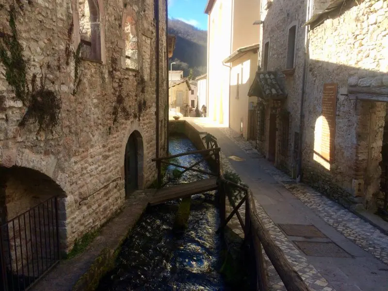 Street In Rasiglia, Umbria With Stream Running Next To It.