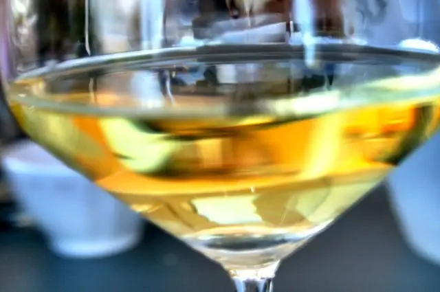 A wine glass full of Trebbiano Spoletino, a white wine from Umbria